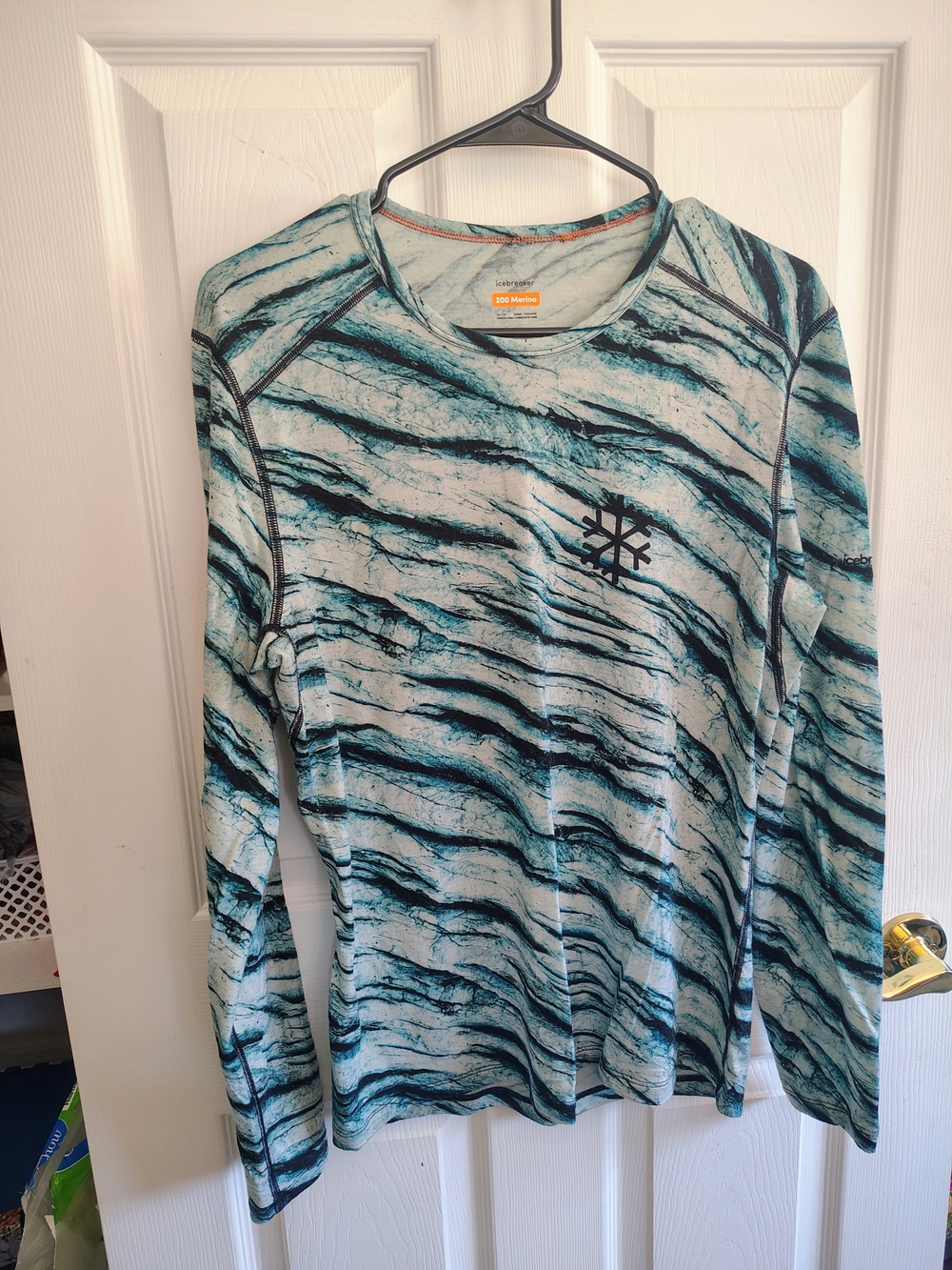 Icebreaker Women's Long Sleeve Top in Teal and Black Wave Print